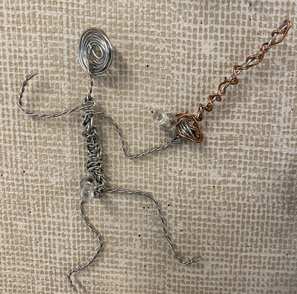 6th grade student's wire figure sculpture of a swordfighter