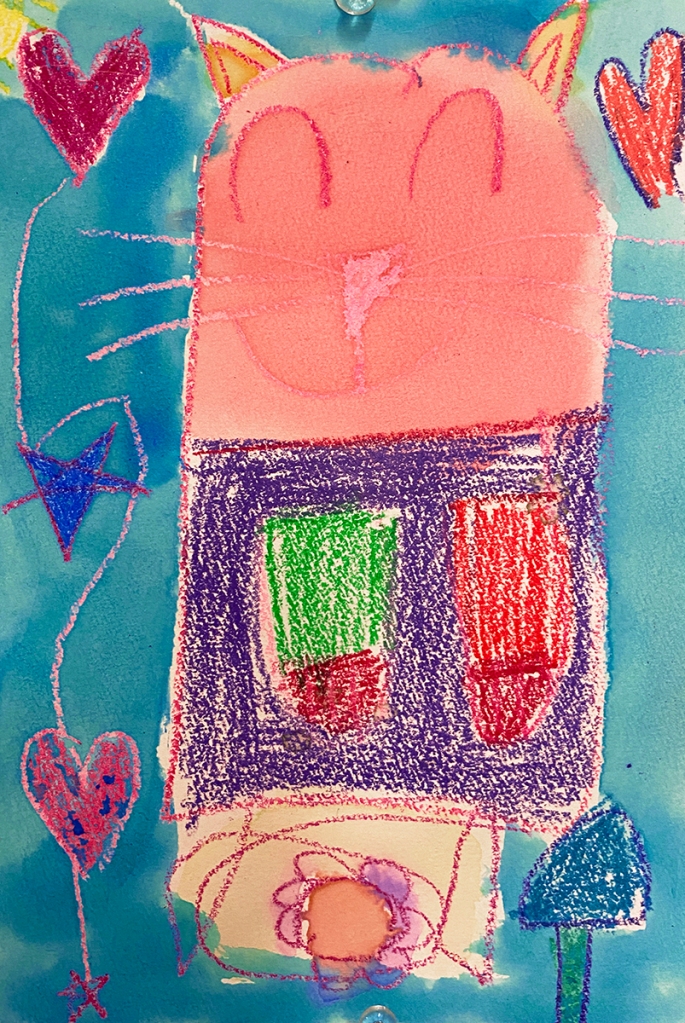 Kindergarten watercolor & crayon resist, finished composition. This shows a pink cat in a purple top on a blue background, surrounded by hearts and stars.